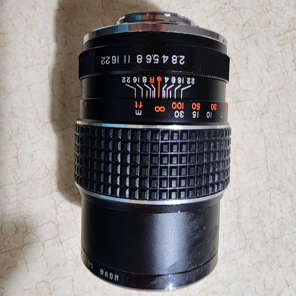 Carenar Camera Lens 1 :2.8 F=135mm No. 7012203 with Hoya Skylight 1A Filter